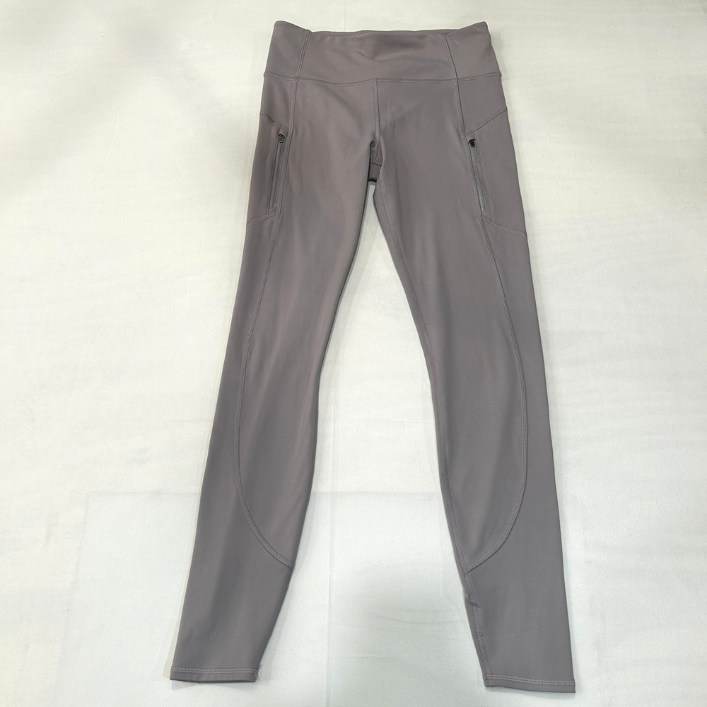 Athleta Womenโs Rainier Tight Leggings Size M Fleeced Lined Gray/Lavender.